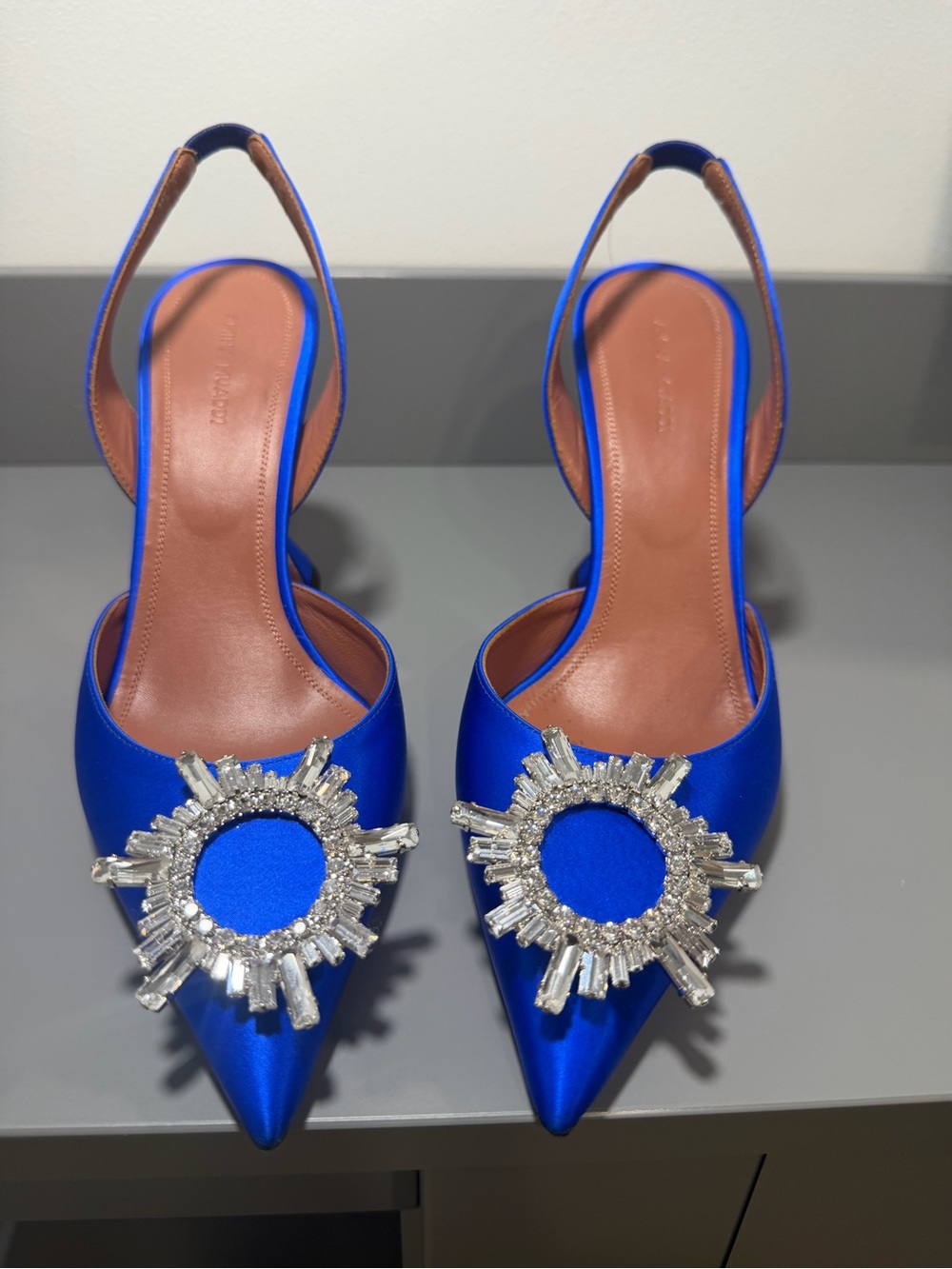 Amina Muaddi Royal Blue Satin Pointed Slingback Heels with Crystal Sunburst